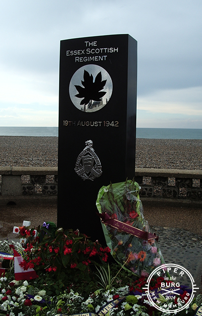 Black, modern style monument with cutout maple leaf