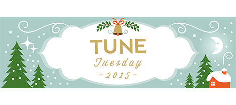 Drawing of evergreen trees and log cabin in winter as snow falls